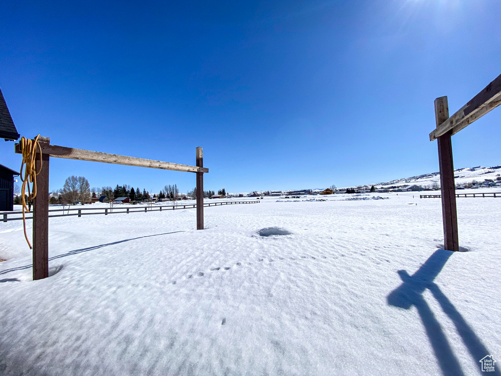 View of yard covered in snow