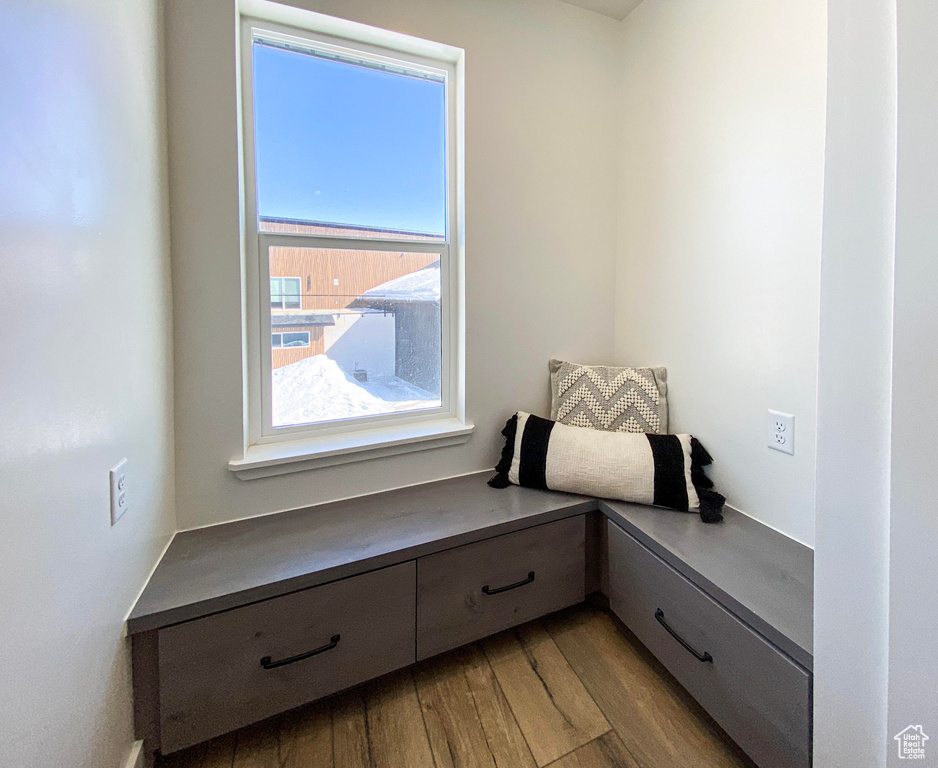 Living area featuring hardwood / wood-style flooring