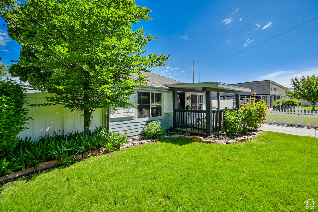 Exterior space featuring a lawn