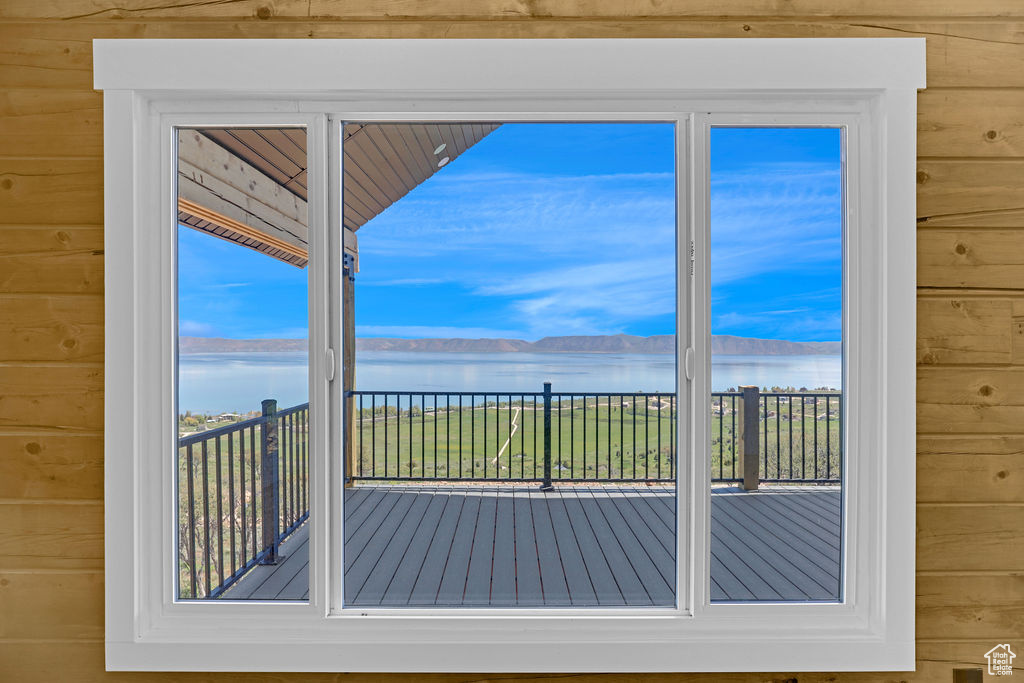 Entryway featuring a water view