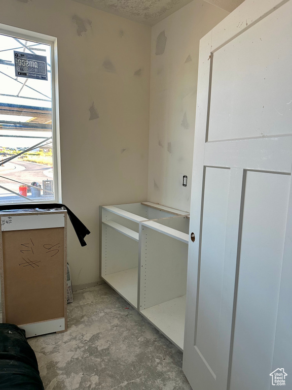 Bathroom with concrete flooring