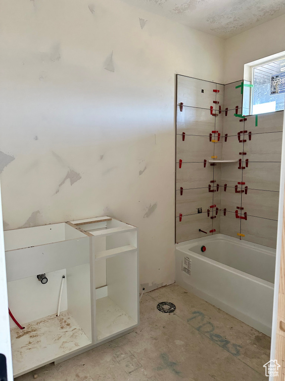 Bathroom featuring bathing tub / shower combination