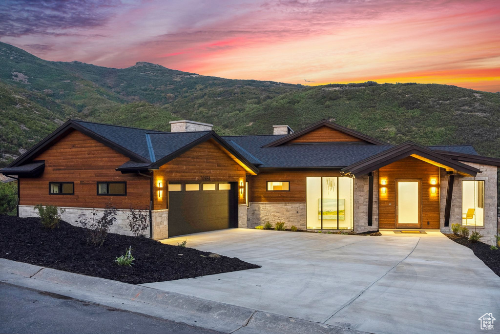 View of front of property with a mountain view