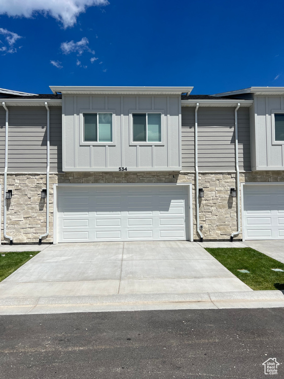 View of front of house with a garage