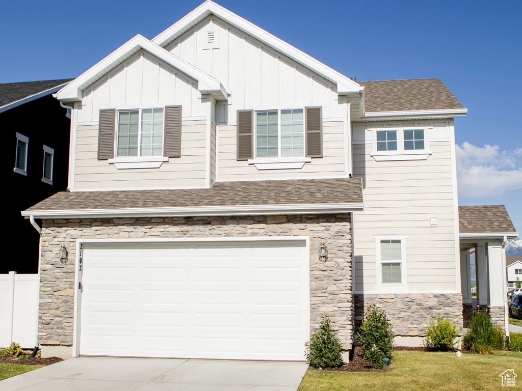 View of front of house with a garage