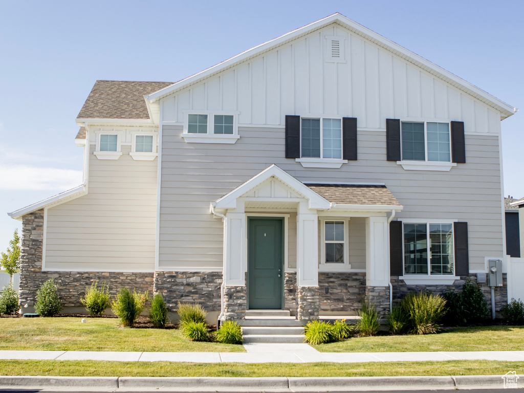 View of front of home with a front yard