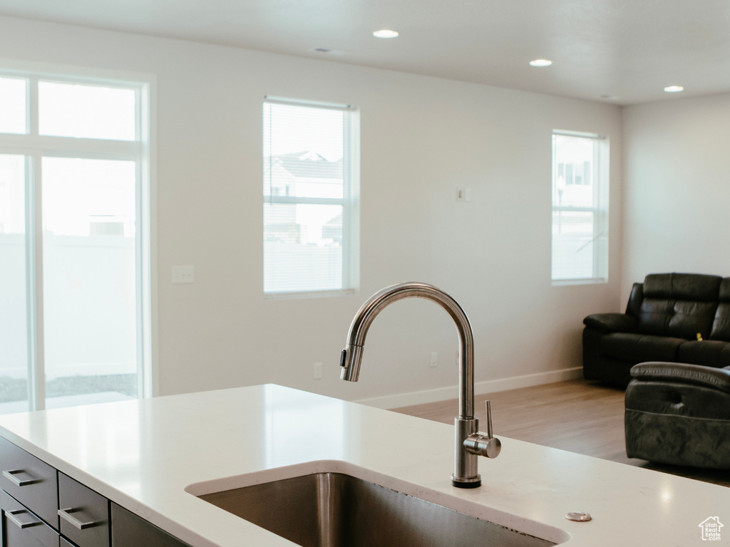 Kitchen featuring light hardwood / wood-style floors and sink