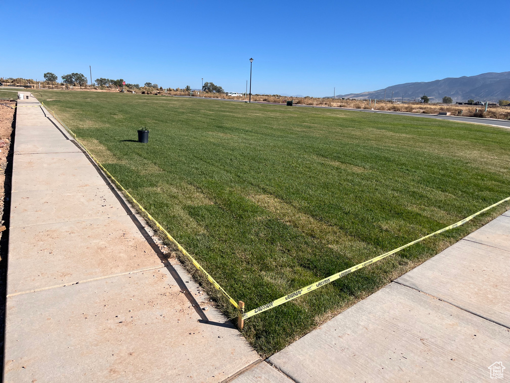 View of yard featuring a mountain view and a rural view