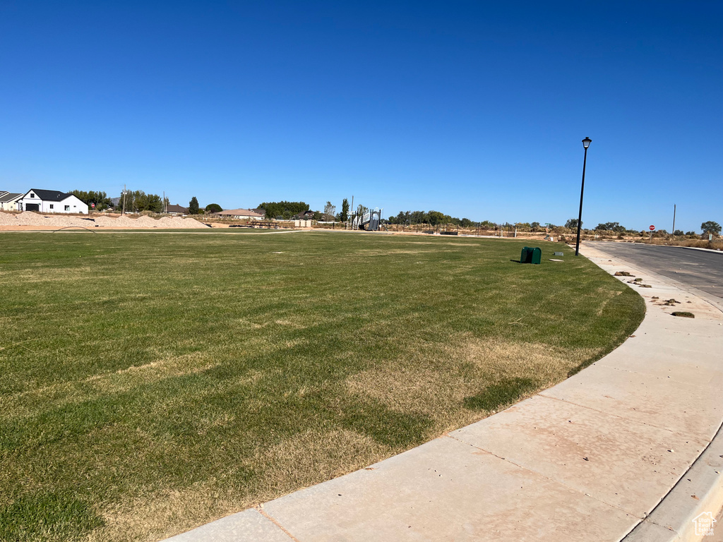 Exterior space featuring a lawn