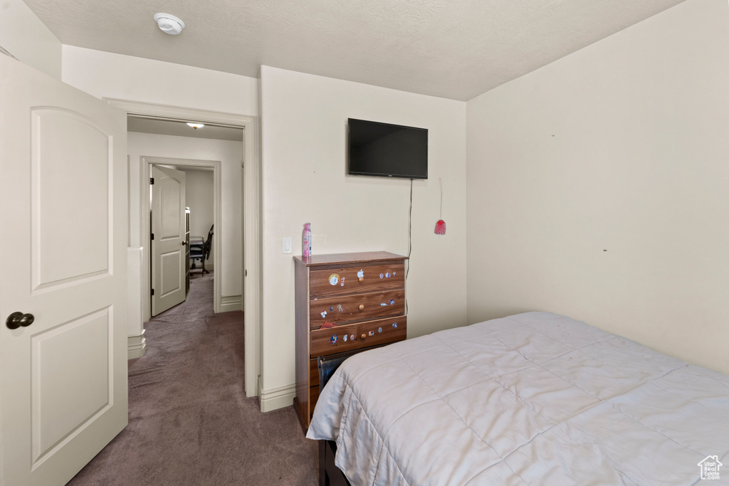 Bedroom with carpet flooring