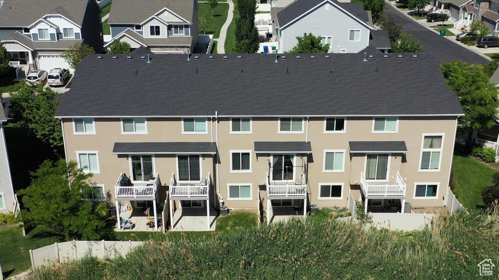 Rear view of house featuring a balcony