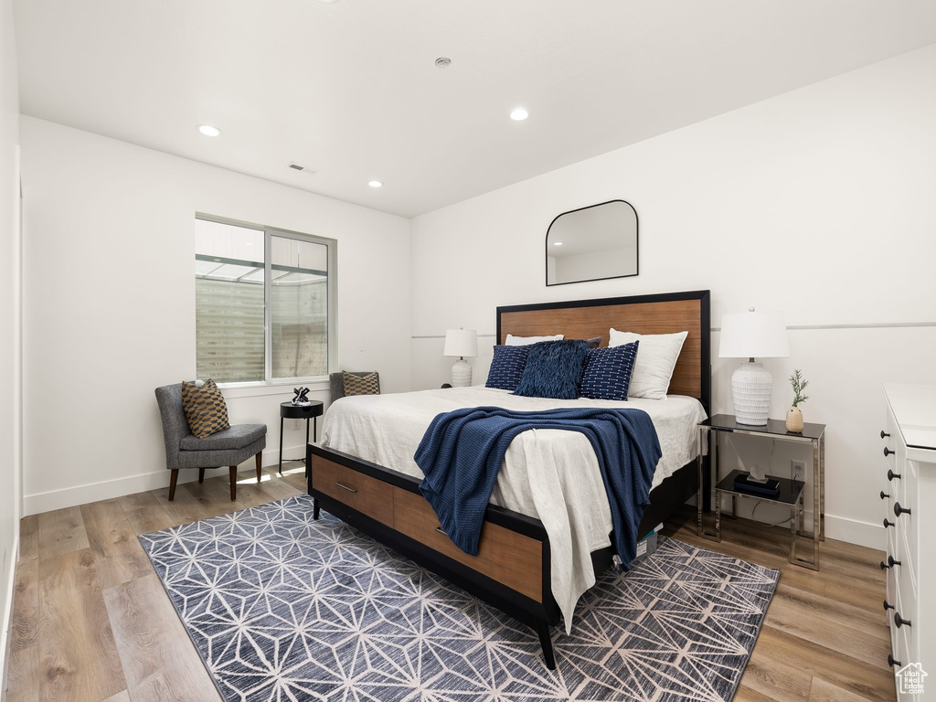 Bedroom featuring hardwood / wood-style flooring