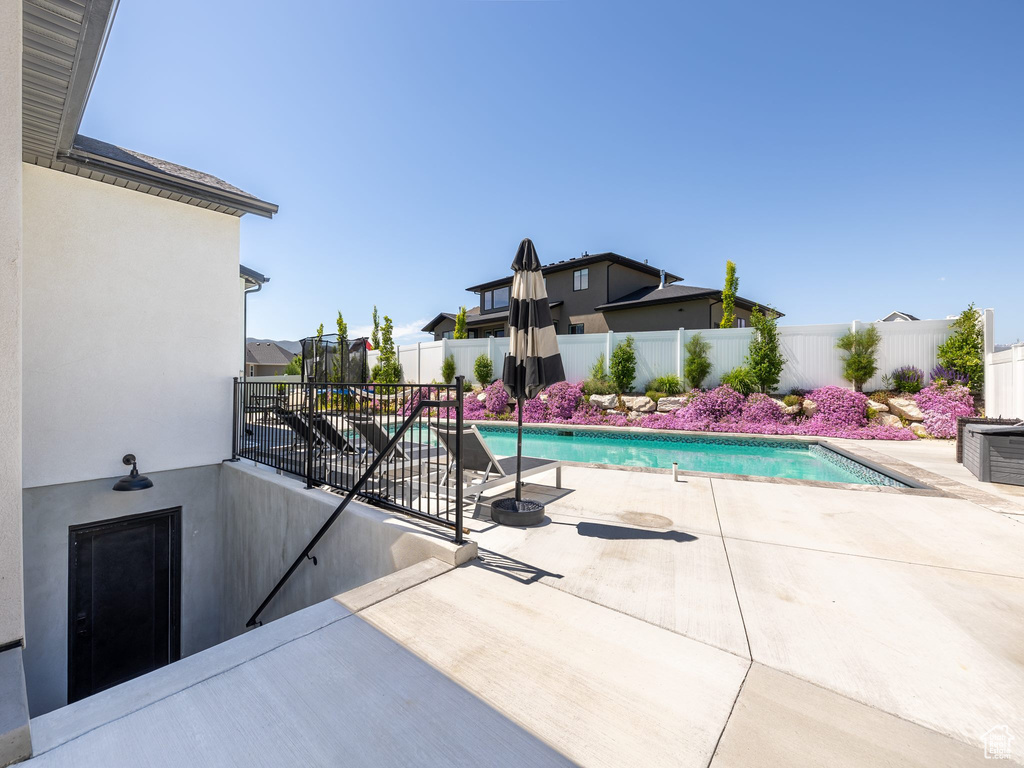 View of pool featuring a patio area