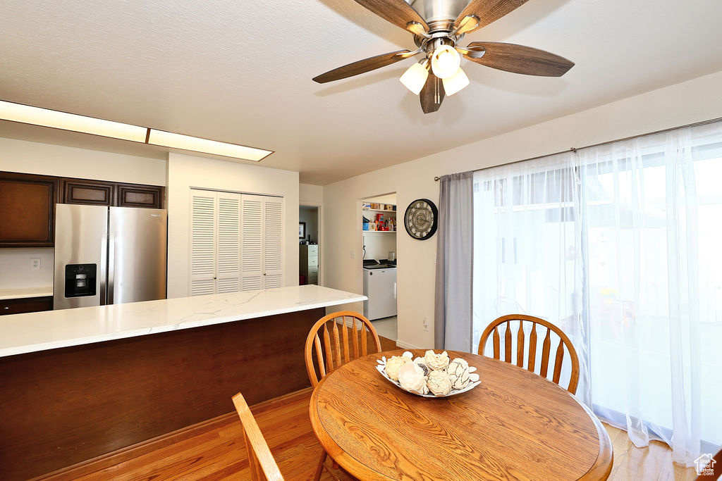 Dining space featuring ceiling fan and light hardwood / wood-style flooring