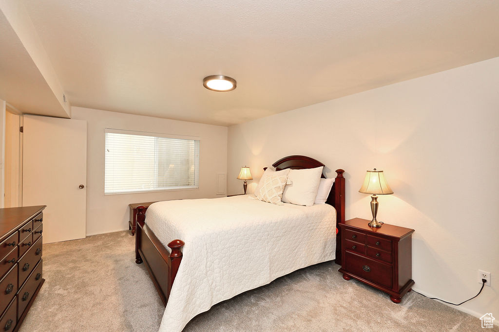 Bedroom featuring carpet flooring