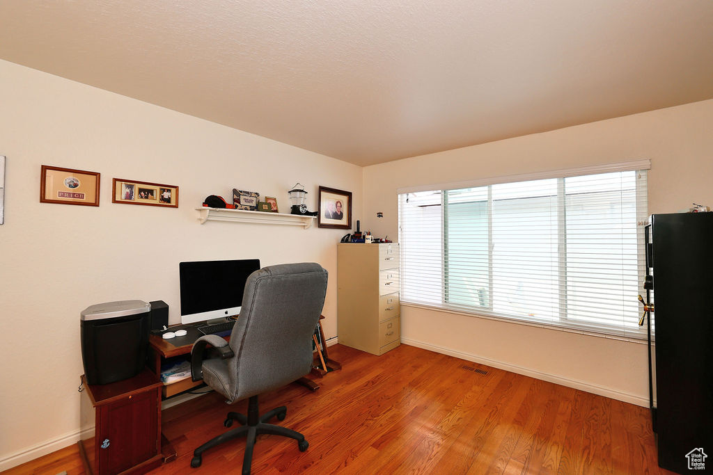 Office featuring wood-type flooring