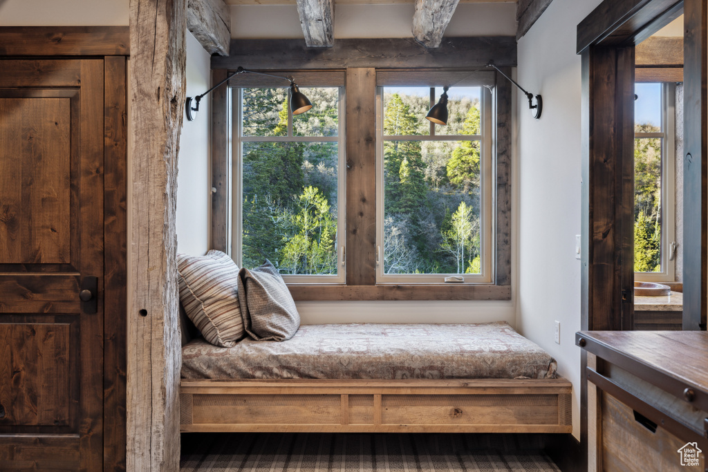 Bedroom featuring multiple windows