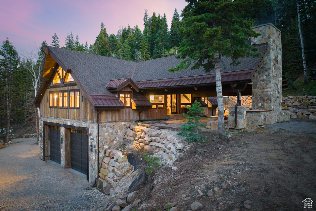 View of front of house with a garage