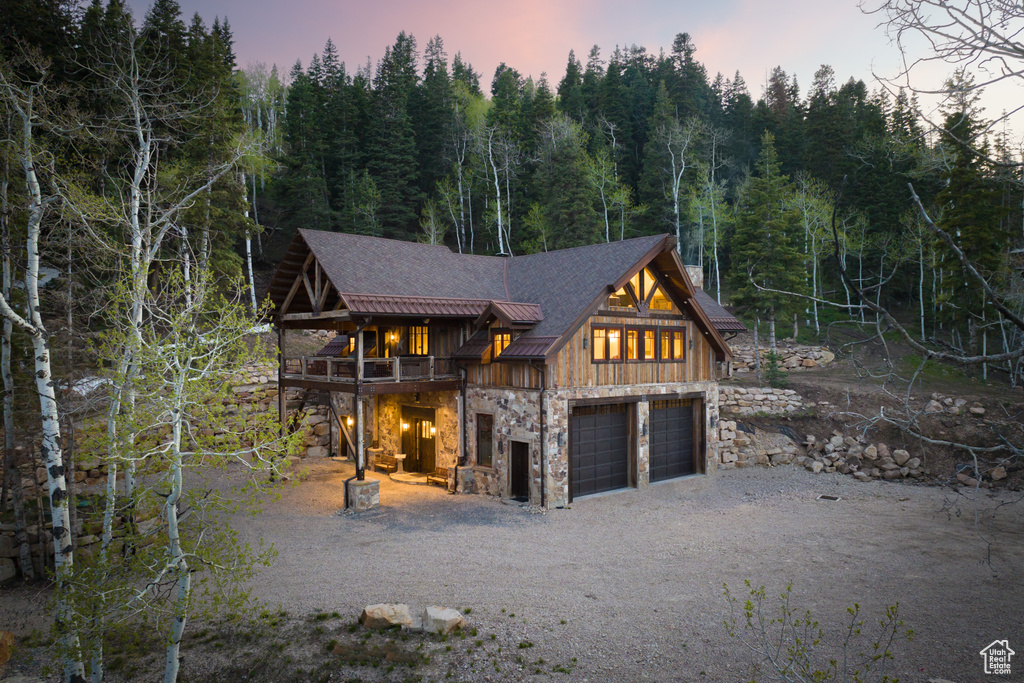 View of front of property featuring a garage