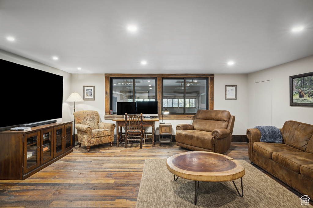 Living room with hardwood / wood-style floors