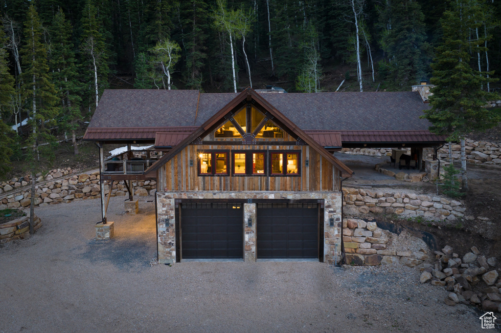 View of front of home featuring a garage