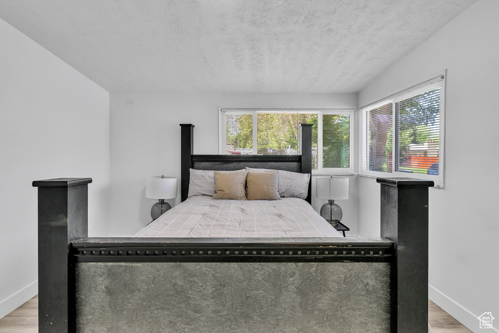 Bedroom featuring hardwood / wood-style floors