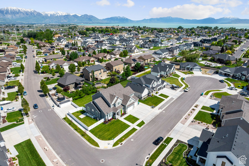 Birds eye view of property with a mountain view