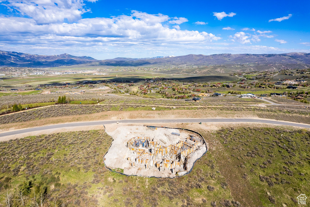 Birds eye view of property featuring a mountain view