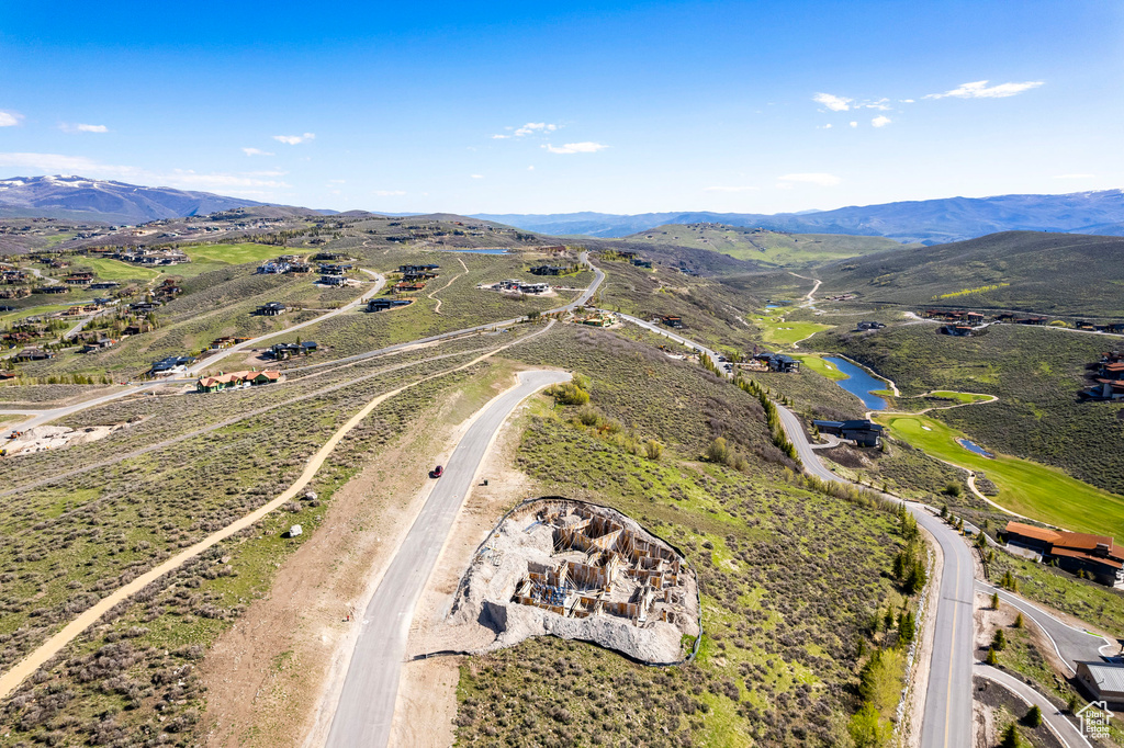 Birds eye view of property featuring a mountain view