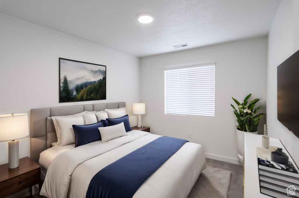 View of carpeted bedroom