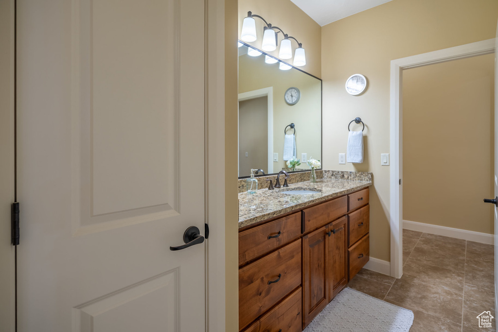 Bathroom with tile floors and vanity