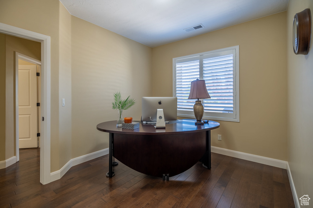 Office featuring dark hardwood / wood-style flooring