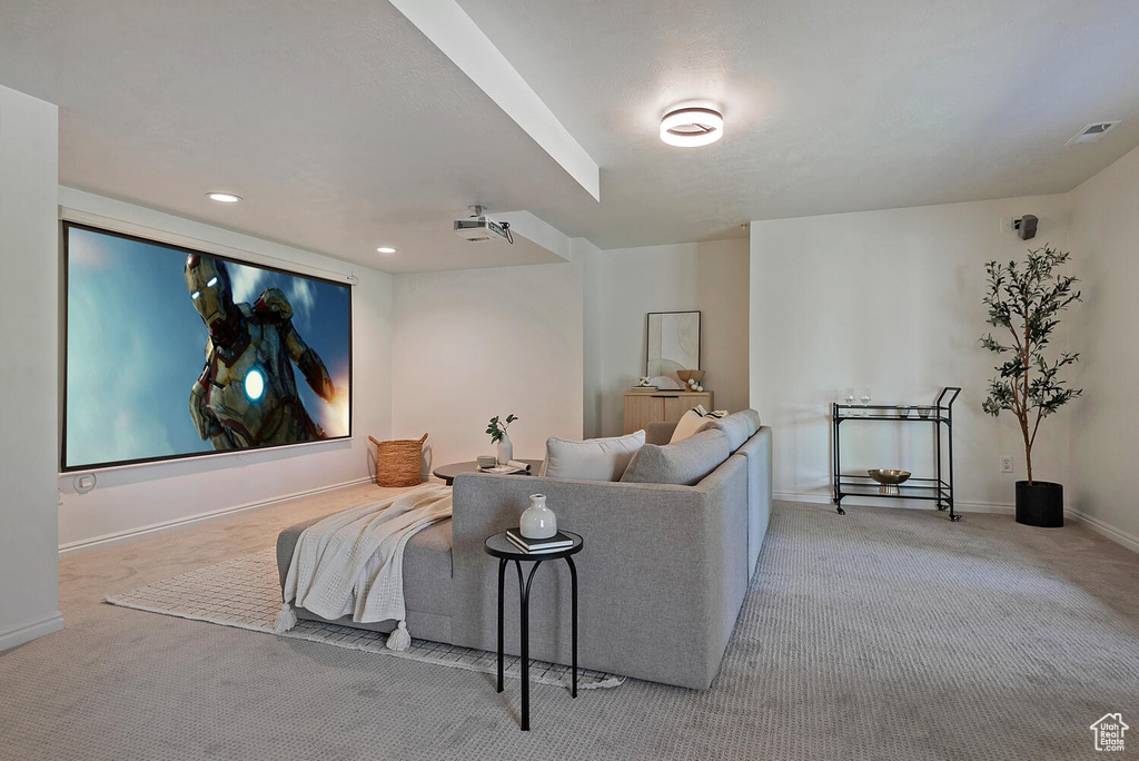 Living room featuring light colored carpet