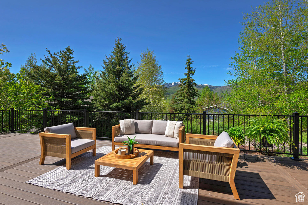 Wooden terrace with outdoor lounge area