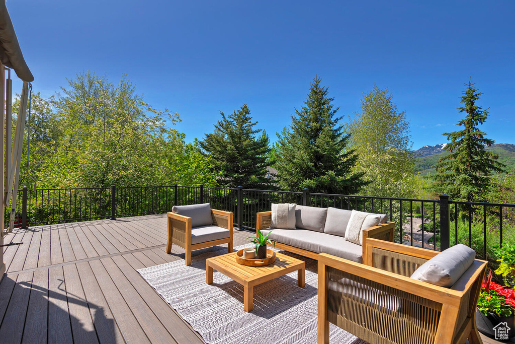 Deck with an outdoor hangout area