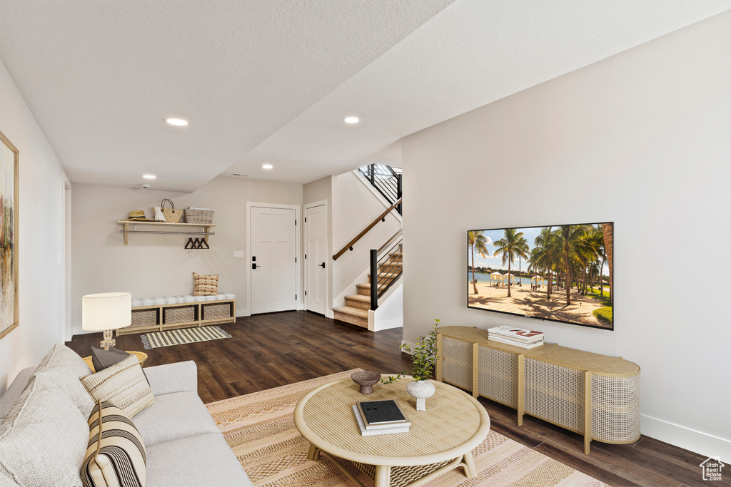 Living room featuring dark hardwood / wood-style floors