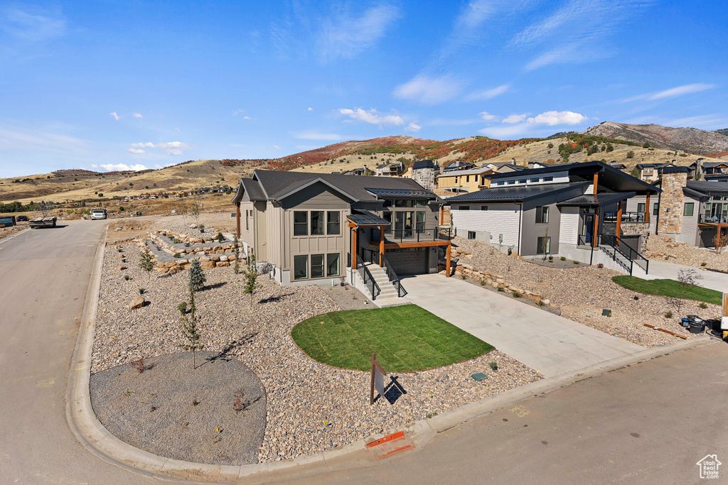 View of front of home with a mountain view