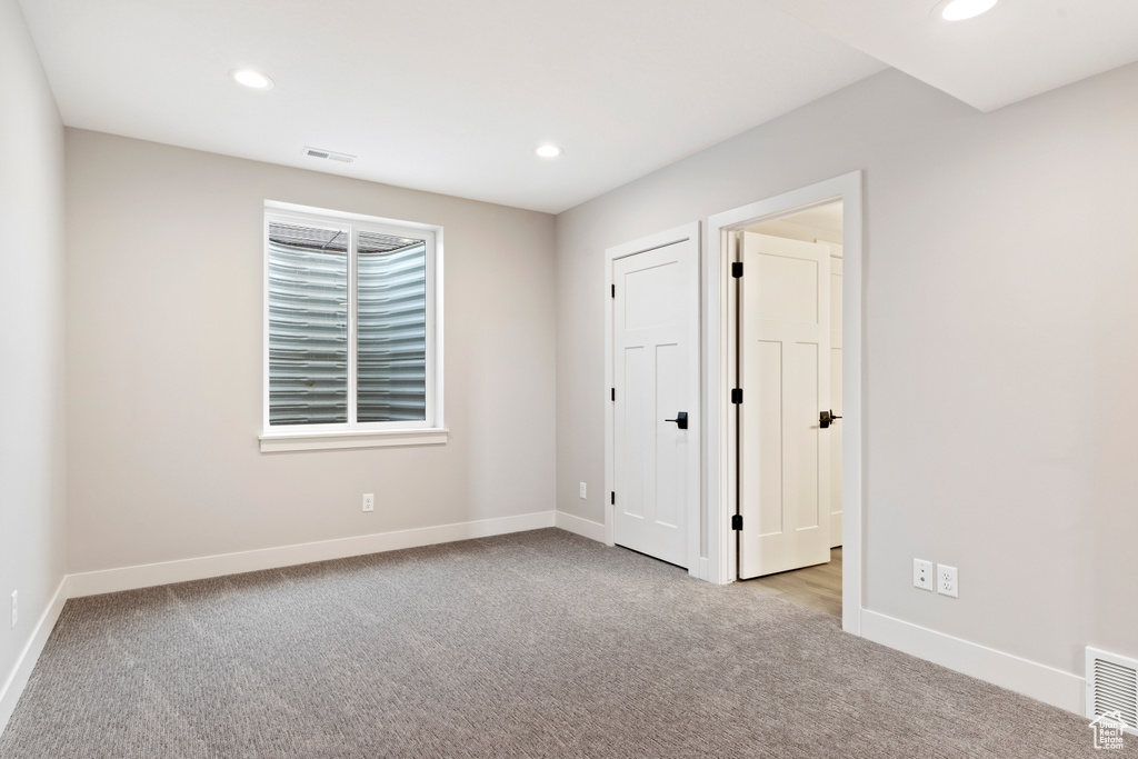 View of carpeted spare room