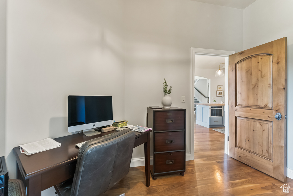 Office space with light wood-type flooring