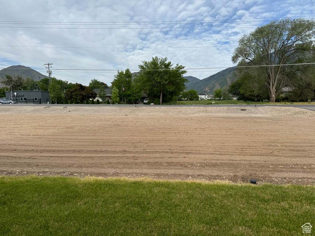 Surrounding community featuring a mountain view