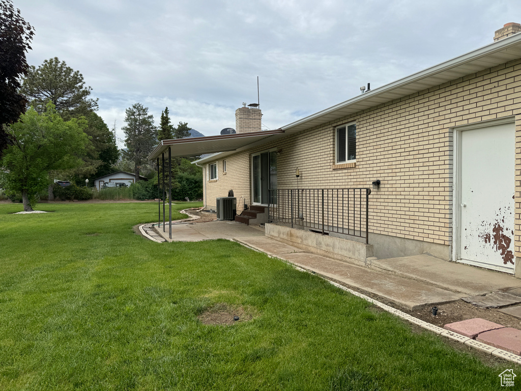 View of yard with a patio area