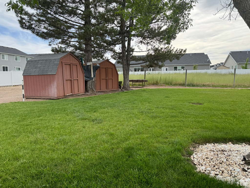 View of yard with a shed