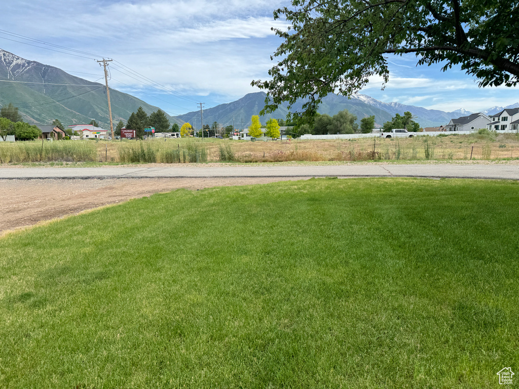 View of yard with a mountain view