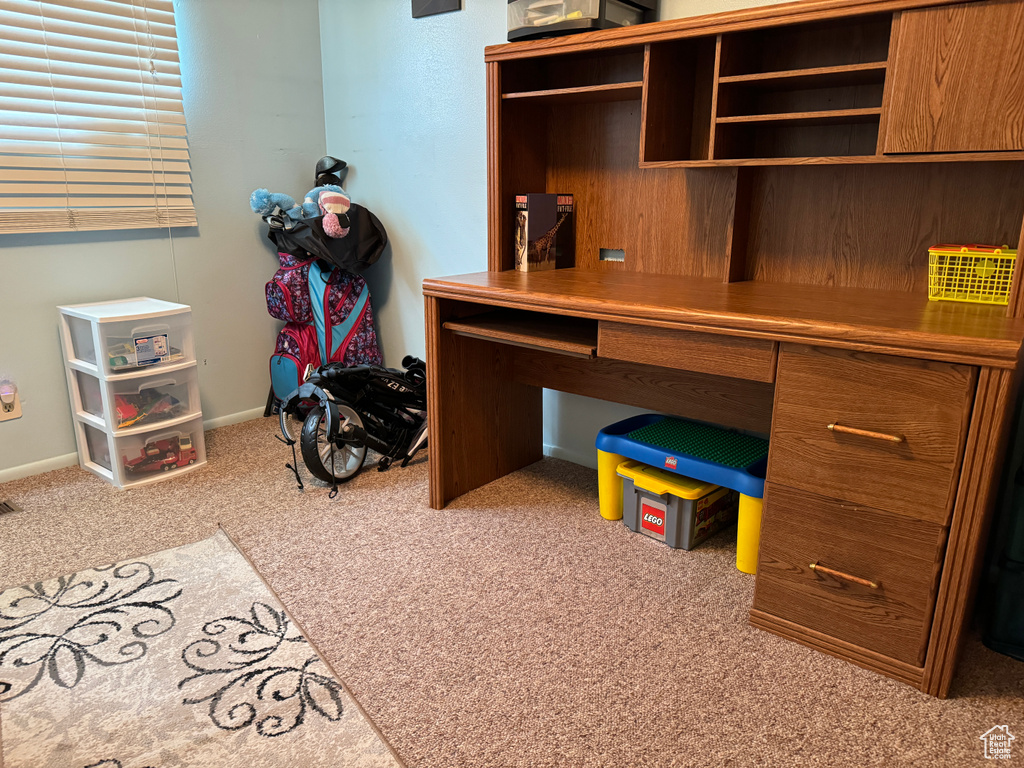 Office space with light colored carpet