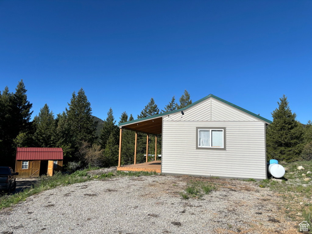 View of home\\\\\\\'s exterior featuring a carport