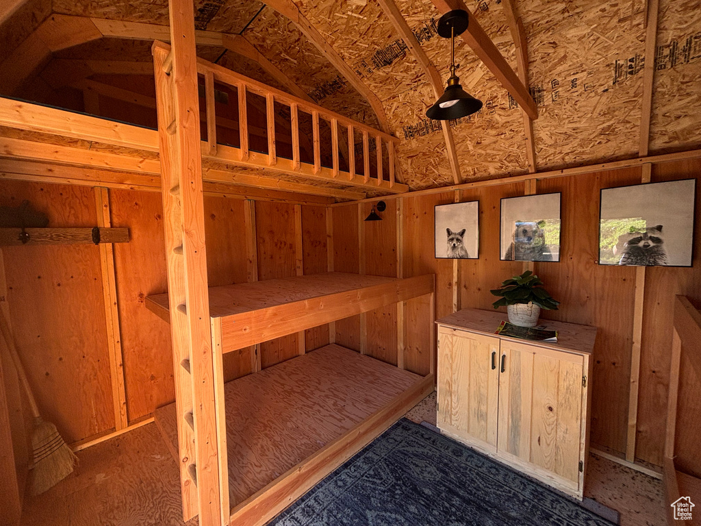 Bedroom with vaulted ceiling