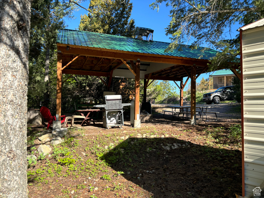 View of yard featuring a gazebo and a patio