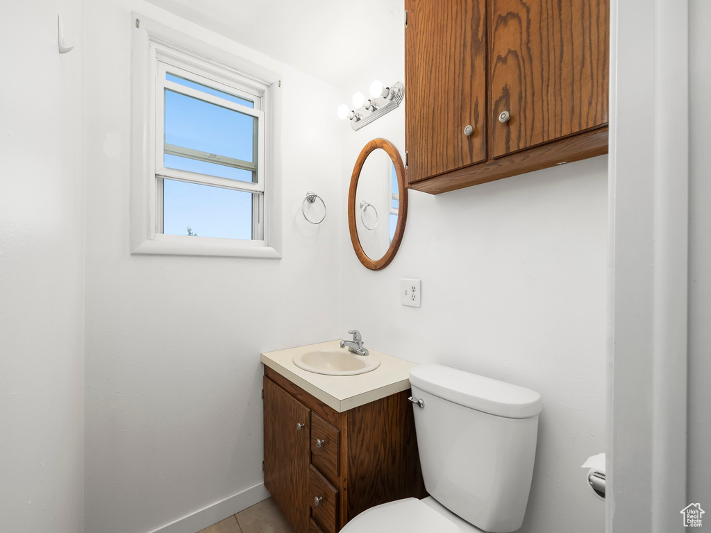 Bathroom with toilet and vanity