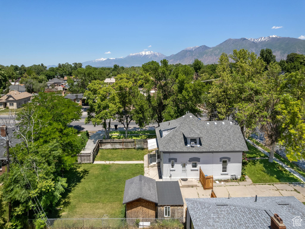 Birds eye view of property with a mountain view