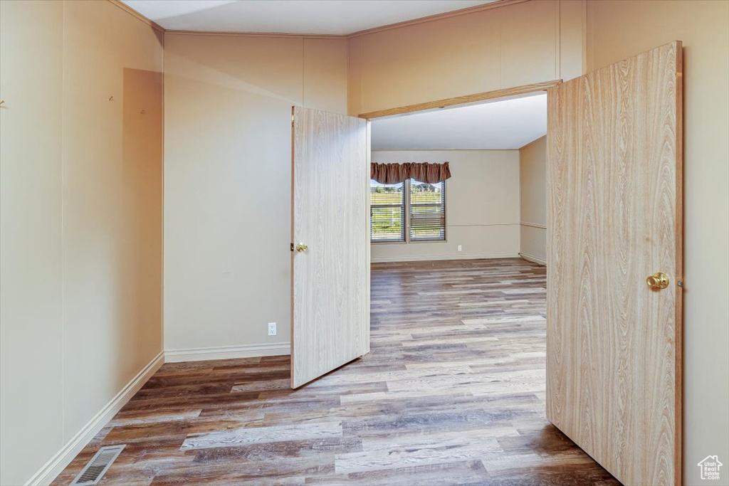 Corridor with wood-type flooring